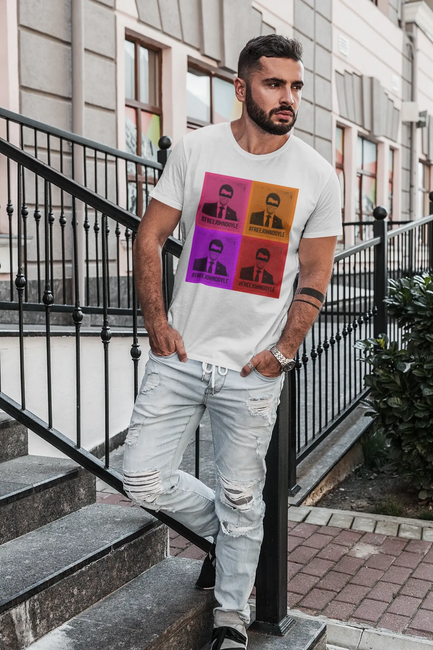 t shirt mockup of a serious looking man standing on concrete steps 1023 el